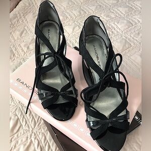Bandolino Black 7 1/2 beautiful strapped dress shoes. Worn once to a wedding!